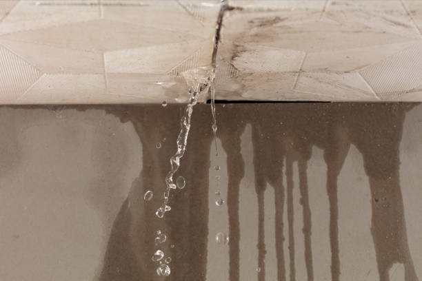 Professional Flood Damage Cleanup technician working in Harborcreek, PA